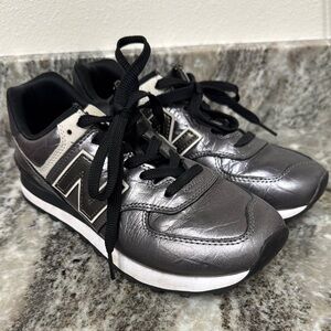 New Balance Silver and Black Sneakers